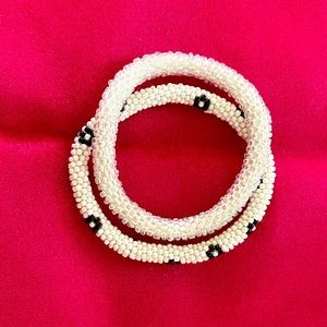 Beaded bracelets:white and white w/ black flowers